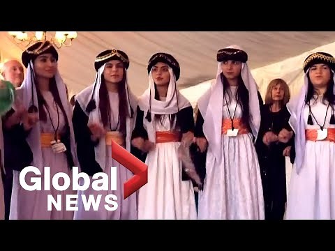 Yazidi women's choir that fled Iraq performs in U.K.