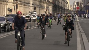 Long a city that embraced cars, Paris is seeing a new kind of road rage: Bike-lane traffic jams