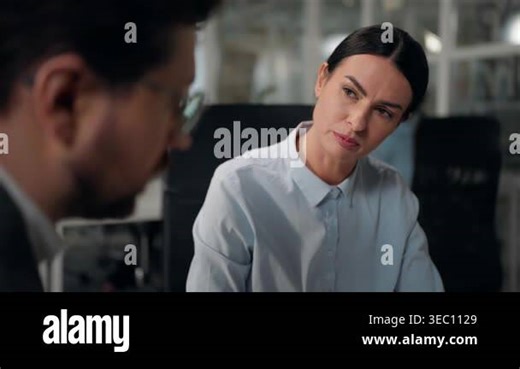 Two Caucasian business employers team businesswoman talking with businessman client company meeting colleagues office partners discuss work job deal talk negotiation consult partnership communicate Stock Video Footage - Alamy