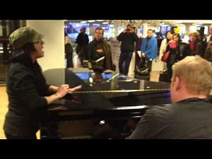 Kat Perkins Sings "Someone Like You" by Adele in Amsterdam Airport