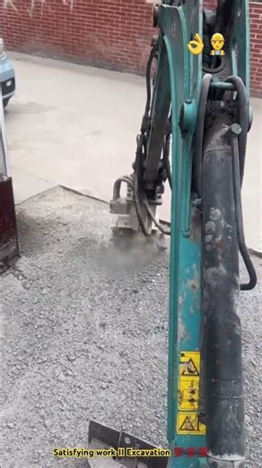 Advanced chisel excavator technique : Breaking concrete rural road