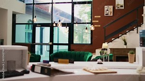 Empty reception front desk and lobby with interior design and luxurious furniture, classy hotel lounge area and counter. Tropical seaside resort with modern decorations, marble floor.