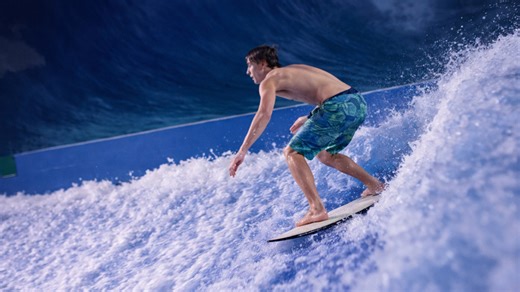 Indoor surfing shows flow riding action