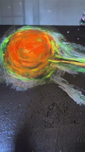 One side is a black hole, one side, a light hole on loop. The golden tongue.