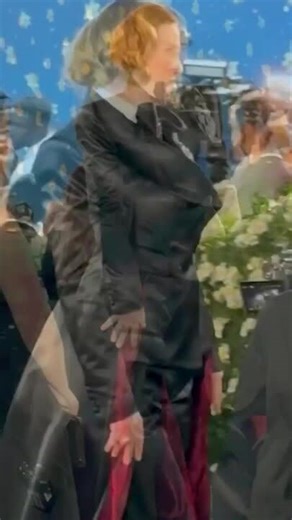 Sarah Snook stuns in black tuxedo and cape at the Met Gala