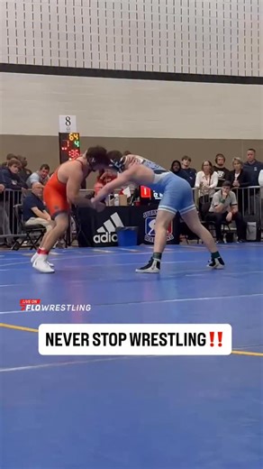 Columbia’s #11 Aaron Ayzerov locks in on the edge for a takedown at the Journeymen Collegiate Classic. | FloWrestling