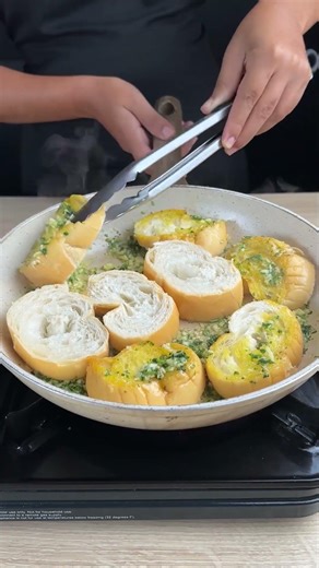 Homemade garlic bread with butter and parmesan crispy