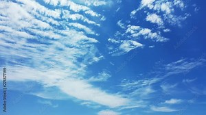 A blue blue sky with cirrostratus cloud in the Bahamas. Pan right