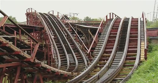 Photo appears to show 2 concrete blocks holding up part of roller coaster