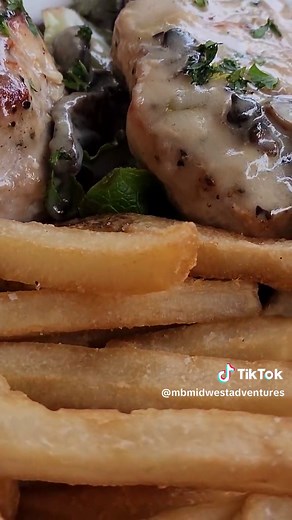 The Gin Mill in Decatur, IL has both indoor & outdoor seating. The inside has red leather booths & an ornately carved bar. There is also a buffalo hanging on the wall & multiple unique chandeliers. Entrees run in the $20-30 range & include dishes like swordfish & these delicious whiskey glazed pork chops. 😋 The sauce consisted of Jameson, cream, onions & garlic. It's definitely worth a stop if you are in Decatur. #theginmill #ginmill #theginmilldecatur #Decatur #decaturil #restaurants #placesto