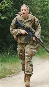 Woman Soldier in the Wisconsin Army National Guard doing a Foot March
