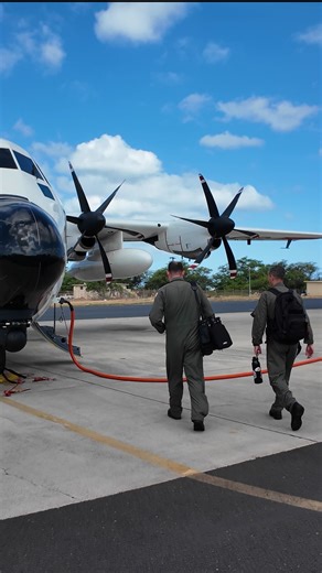U.S. Coast Guard Air Station Barbers Point conducts flyover of Hawaiian Islands folllowing tsunami