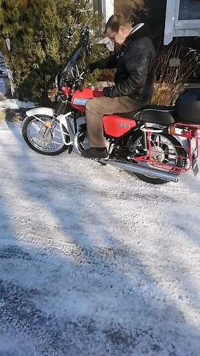 Classic JAWA Motorcycle in Winter Wonderland