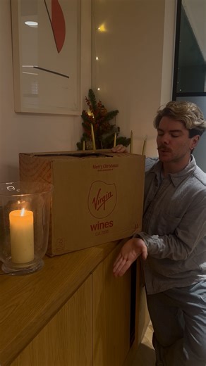 Chris Hall on Instagram: "Take time this December to reflect on your year, think back on your choices…the good, the bad and the misinformed. We’re only human, and because we’re human, we all deserve a treat. Sign up to @virginred and start earning Virgin Points straight away. Cash in your Virgin Points to treat yourself, why not a case of @virginwines to share amongst your loved ones! #AD"