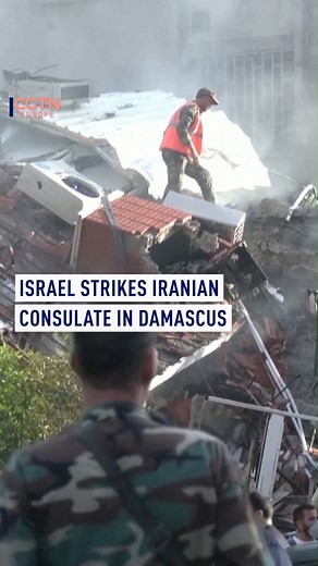 Iranian protesters gathered in Tehran, burning Israeli and American flags to condemn an Israeli attack on #Iran 's embassy in #Syria . The escalation comes with #Tehran confirming the deaths of seven military advisers, including three senior commanders. Israel, known for targeting Iranian installations in Syria, has yet to comment on the strike. Iran has vowed a "harsh" response. #Israel #Gaza | CGTNEurope