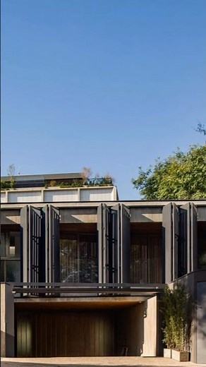 Urban Elegance: Vertical Louvers & Rooftop Greenery 🌇🌿