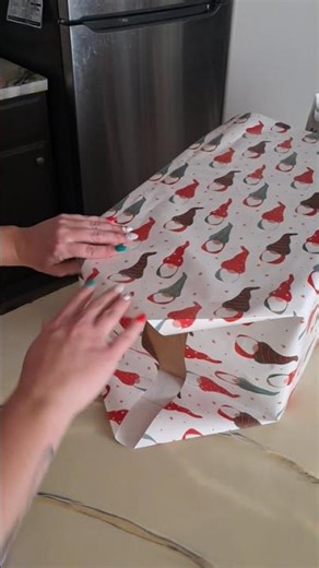 This is the best tool to help with all your tapping needs!! #tapegun #wrapping #giftwrapping