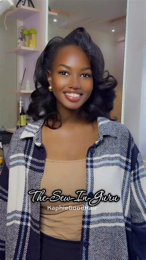 Stunning 16 Inch Body Wave Sew-In Hairstyle