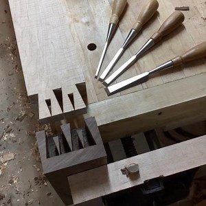 Heres the last post of my series on cutting a houndstooth dovetail for the end cap on a Roubo workbench. This time we get to see how it fits! In the video, I attempted it at first but it was a little too tight, so I had to pare a little away before it made it home for a nice tight fit. The woods used are curly hard maple and walnut. Thank you all for watching this series of time lapses. I'm also happy to build a workbench or a custom piece of furniture for you. Just message me for price inquirie