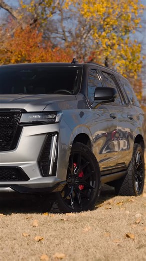 ’24 CADILLAC ESCALADE V MILES - 21,895 - STOCK - 20615A 6.2L V8 Supercharged Engine Custom 2.5” Lift 24” Vossen Wheels Nitto Recon Grappler A/T Tires - 35X12.50R24LT Argent Silver Metallic Exterior Custom Black Upper Half Wrap Power Side Steps Rear Entertainment System Jet Black Interior PRICE - $139,991 LEWISVILLEAUTOPLEX.COM #autoplexcustoms #cadillac #escaladeV #vossen #Nitto | Lewisville Autoplex