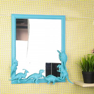 A stunning mirror with nice blue dinosaurs. 󾌧 | 5-Minute Crafts