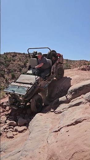 0ne of several sketchy drops on the Steel Bender Trail in Moab.