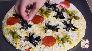This fun SPIDER PIZZA takes just minutes to make & the Kids will LOVE this for Halloween...great Party Idea! Full Directions here ➡️ http://bit.ly/2dLP7T6 . | Kitchen Fun With My 3 Sons