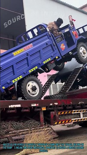 Farm Vehicle Loading: Safely Loading a Utility Truck Onto a Trailer