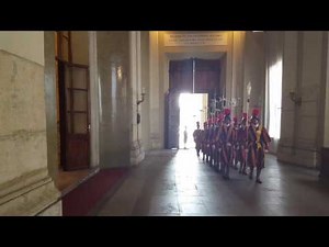 Swiss guards marching in Vatican's apostolic palace