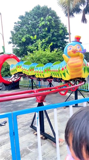 🚂❤️ Riding the green train ride at the carnival market 🌈 #shortsfeed #shorts #trending #cute