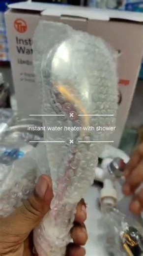 Instant water geyser with shower attachment