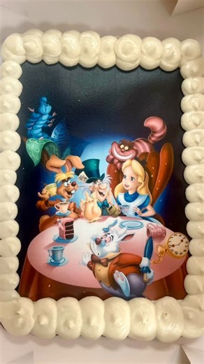 Jennys Baking Co. on Instagram: "Cookie cake meets “Alice in Wonderland”🌈🫖💕All images are printed in house for cookies and cakes! 😊Today’s case is Coconut cream pie by the slice, Cinnamon Rolls, Maple Pecan Rolls, Apple Cider “Donut” Loaf, Vegan Pumpkin Loaf, Lemon Poppy Scones, Sprinkle Cookies, GF Oat PB Choc Chip Cookies and Ginger Molasses Cupcakes!🍂Open today from 7:30am - 12:30pm! Stop by this week for a slice of dreamy coconut cream pie 🥥, fresh ground cold brew, iced chai, fresh ci