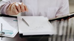 Laboratory, science and writing notes of Japanese person with research, study checklist and medical report. Planning, worker and hospital with healthcare and pharmaceutical job with paperwork