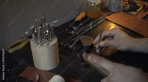 Handmade Notebook from Leather and Wood - Manufacture - close up Hands work