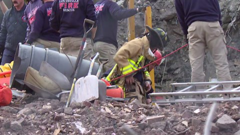 Crews work to rescue worker trapped under rubble at Louisville construction site