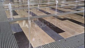 running fountain in the summer. Global warming, rescue from the heat by fountains