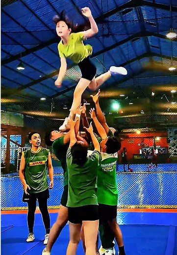 Unfortunate Hand Placement in Cheerleading Stunts
