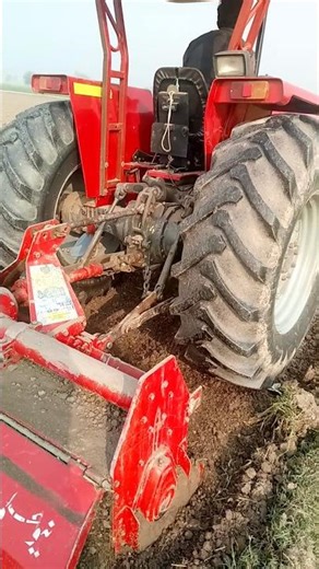 Tractor Working in Field for Corn Farming