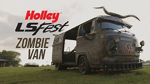Most of our backseats are chock full of empty snack wrappers, crumbs, and other forgotten junk. This insane VW bus, spotted at LS Fest 2020, has a twin-turbo LS in its backseat. While the zombie-apocalypse-esque exterior cladding is anything but subtle, we doubt anyone would expect the monster power plant inside. Check out the video and see more great car features at www.motorlife.com. | Holley LS Fest