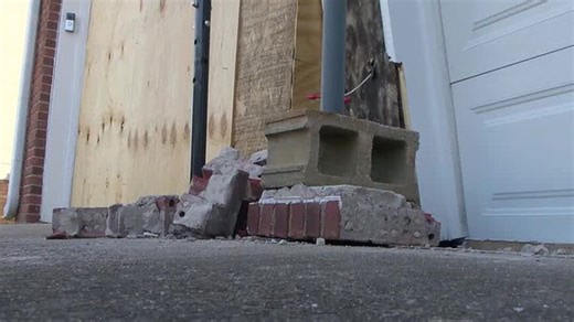 Woman accused of driving into couple's home | Haystack News