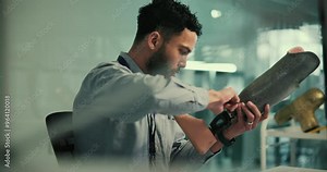 Design, development and man in lab with prosthetic leg, maintenance and innovation in technology. Future robotics, medical engineering and technician with inspection for artificial limb production