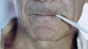 Farmer smoking a handmade cigar. Simple man. Country man