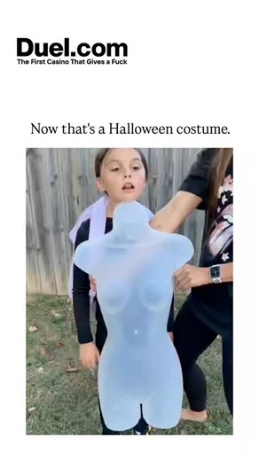decode world on Instagram: "The post shares a 71-second video of young girls DIY-ing a surreal ghost costume using a clear plastic mannequin torso strapped to a backpack, white sheets for ethereal effects, and red tape for accents, turning a child into a floating headless figure for Halloween laughs. Released on Halloween 2025, it exploded to 6.5 million views and 79,000 likes within days, underscoring the platform's role in amplifying wholesome, creative family content during holidays. Replies