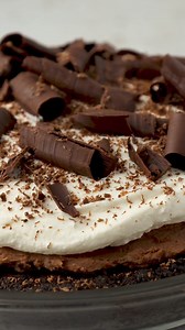 My version of Mud Pie is, of course, my personal favorite 😋 I use an oreo crust as the base, followed by a rich brownie layer, chocolate pudding mousse, and my popular homemade whipped cream. It’s cool and creamy, a chocolate lovers dream! 🤤 #mudpie #mudpierecipe #mississippimudpie #summertreat #blogger #food #foodblogger #dessert #michiganblogger #bakery #bakinggoals #ohmyyum #recipes #recipe #recipedeveloper #easyrecipe #bakingtips #bakinghacks | The First Year