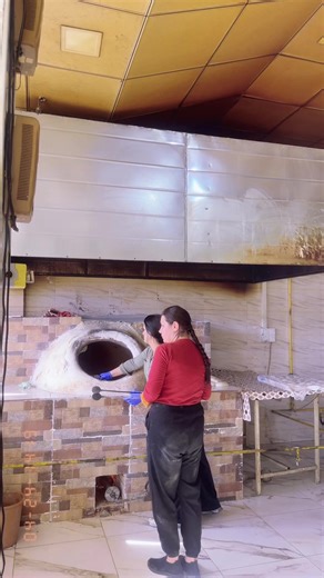 Traditional Bread Baking in a Rustic Brick Oven