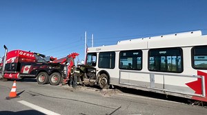 Watch as an OC Transpo bus is helped out of a ditch