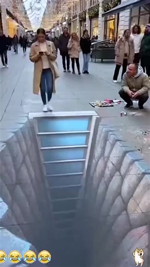 Robot Falls into Fake Hole on Sidewalk