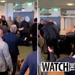 Watch fight break out at Sandown races as one man sucker punches another to the ground