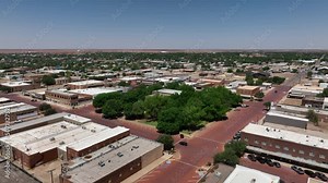 Aerial Lamesa Texas city square business part 1. Rural central Texas oil field town. County government. Old historic downtown, city square center town. Green trees in park. Business. Stock Video