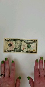 Here's a video of how to fold a #moneyorigami baby bootie from a dollar bill. Makes a great #babyshowergift Tag #origamifoodie if you make your own. | FaVe Mom